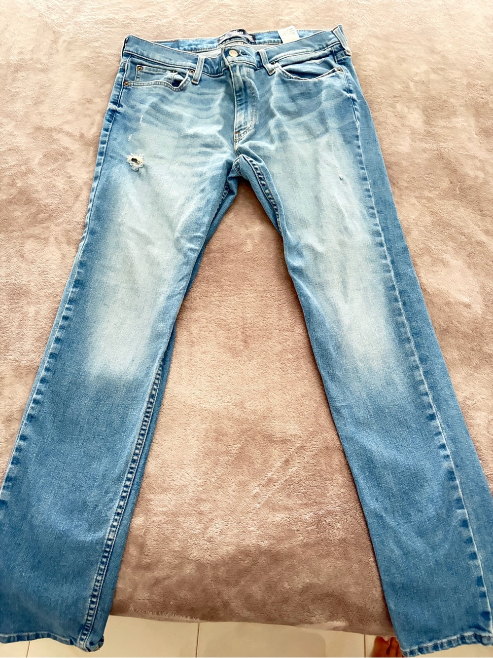 Hollister Light Wash Men's Straight Jeans with Subtle Distress